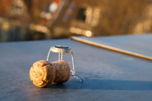 Easter on the roof terrace, champagne corks in the evening light Easter on the roof terrace, champagne corks in the evening light
